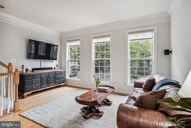 4160 Timber Log Way, Fairfax, VA 22030 - living area featuring ornamental molding, light wood finished floors, stairway, and healthy amount of natural light