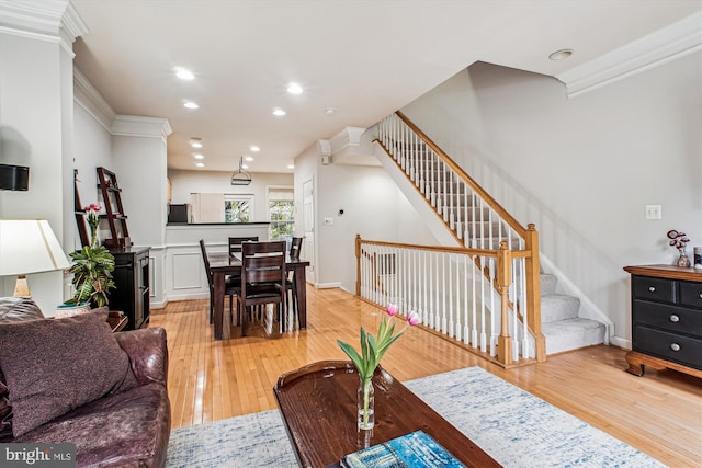 4160 Timber Log Way, Fairfax, VA 22030 - living area featuring light wood-type flooring, stairway, recessed lighting, baseboards, and ornamental molding