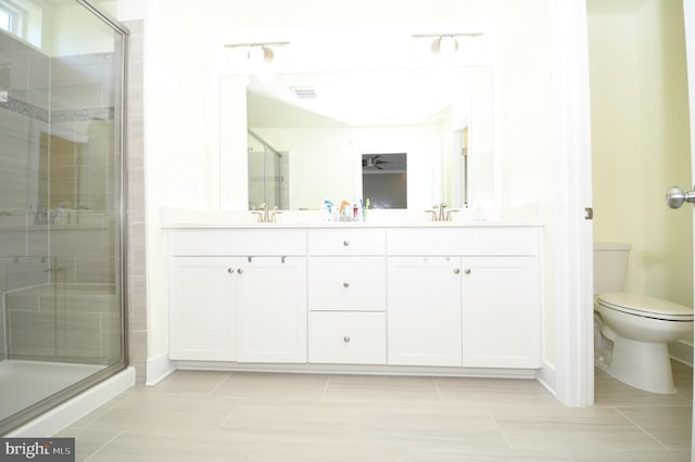 41 Green Dome Pl, Gaithersburg, MD 20878 - full bathroom with a stall shower, toilet, double vanity, and baseboards