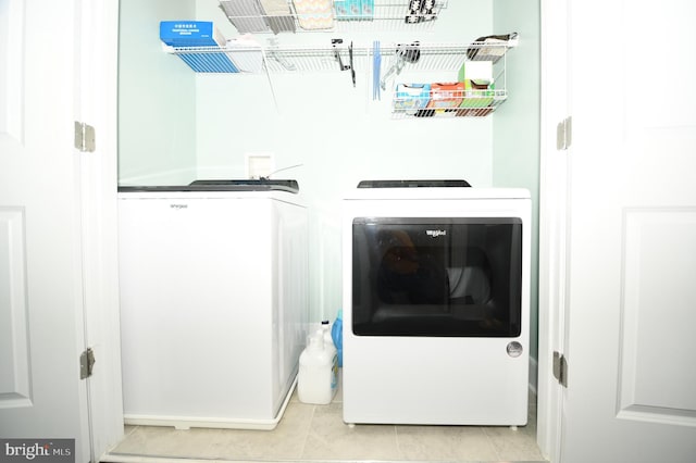 41 Green Dome Pl, Gaithersburg, MD 20878 - laundry area featuring separate washer and dryer and tile patterned flooring