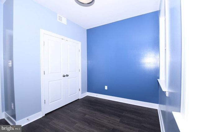 41 Green Dome Pl, Gaithersburg, MD 20878 - unfurnished bedroom with dark wood-style flooring and baseboards
