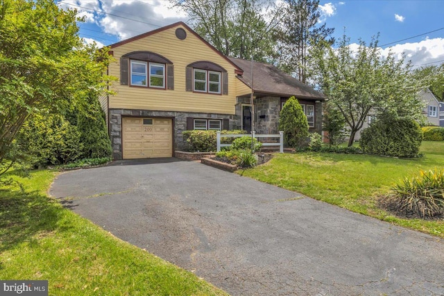 200 Boxwood Ln, Cinnaminson, NJ 08077 - split level home with stone siding, asphalt driveway, an attached garage, and a front lawn