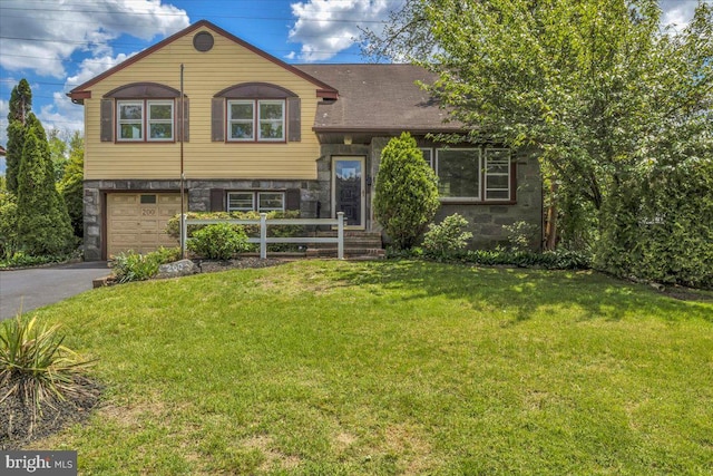 200 Boxwood Ln, Cinnaminson, NJ 08077 - split level home with a garage, driveway, stone siding, and a front lawn