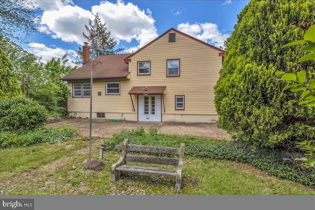 200 Boxwood Ln, Cinnaminson, NJ 08077 - rear view of house featuring a chimney and a patio