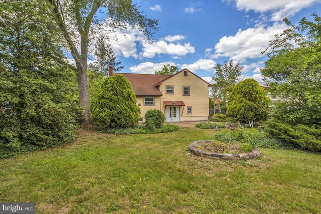 200 Boxwood Ln, Cinnaminson, NJ 08077 - view of front of home with a front yard and a chimney