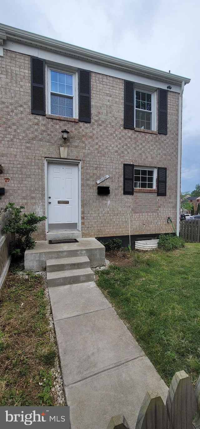 16620 Galt Ct, Woodbridge, VA 22191 - view of front of property with brick siding and a front yard