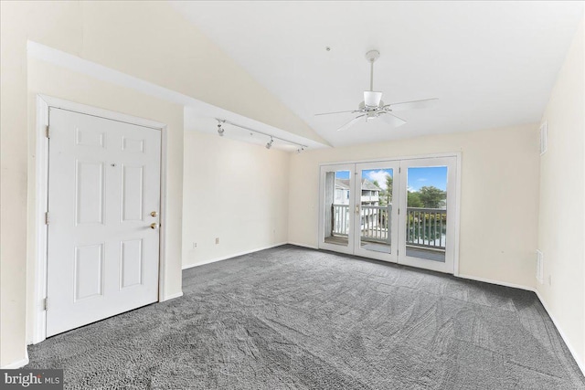 1707 Waters Edge Dr Unit 07, Newark, DE 19702 - empty room featuring carpet flooring, ceiling fan, vaulted ceiling, baseboards, and rail lighting