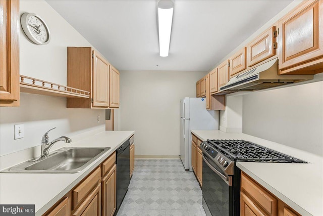 1707 Waters Edge Dr Unit 07, Newark, DE 19702 - kitchen featuring gas stove, a sink, under cabinet range hood, dishwasher, and light countertops