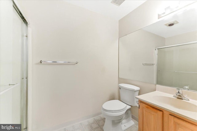 1707 Waters Edge Dr Unit 07, Newark, DE 19702 - full bath featuring toilet, vanity, baseboards, and a shower