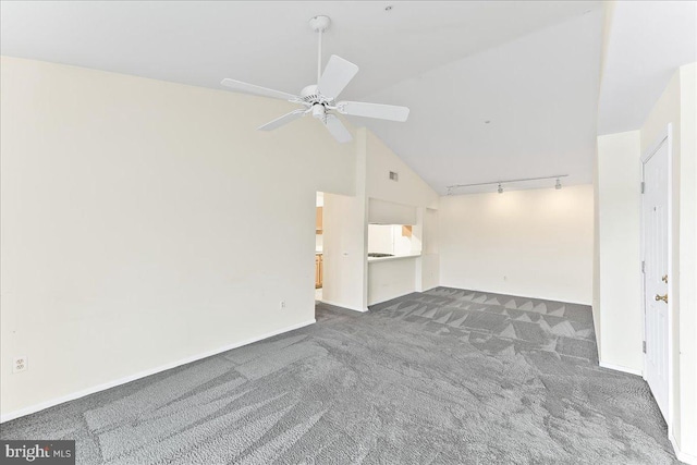 1707 Waters Edge Dr Unit 07, Newark, DE 19702 - unfurnished living room featuring carpet flooring, ceiling fan, track lighting, baseboards, and high vaulted ceiling