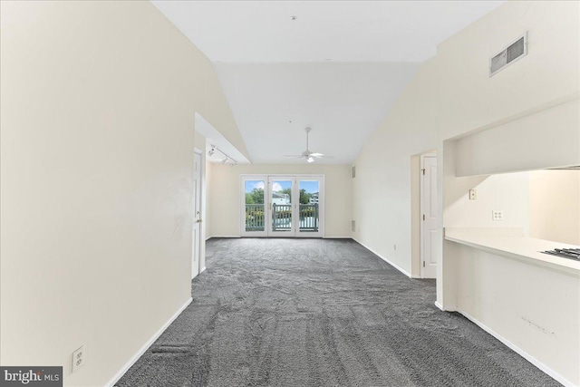 1707 Waters Edge Dr Unit 07, Newark, DE 19702 - unfurnished living room with carpet flooring, a ceiling fan, baseboards, and high vaulted ceiling