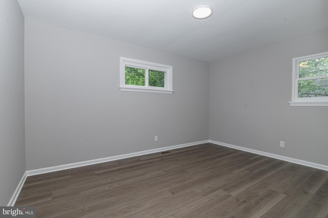 609 6th Ave, Brunswick, MD 21716 - unfurnished room with dark wood finished floors and baseboards