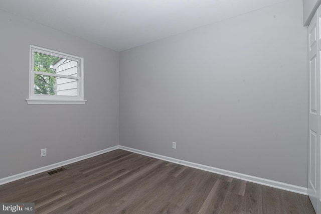609 6th Ave, Brunswick, MD 21716 - empty room with dark wood-type flooring and baseboards