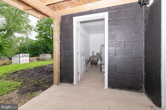 609 6th Ave, Brunswick, MD 21716 - doorway to property featuring concrete block siding and a patio
