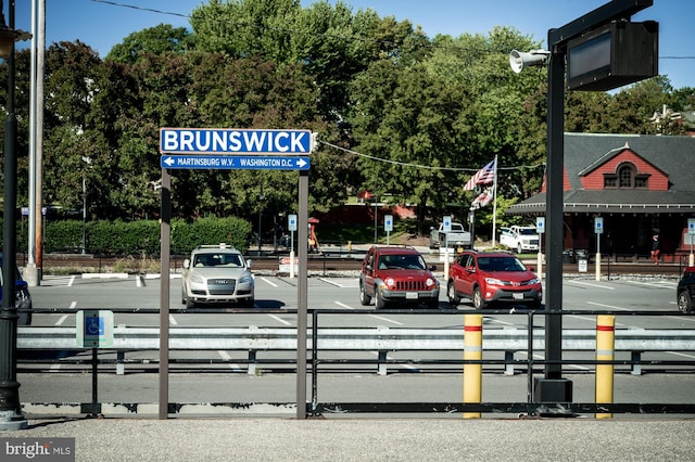 609 6th Ave, Brunswick, MD 21716 - view of asphalt road with traffic lights and curbs