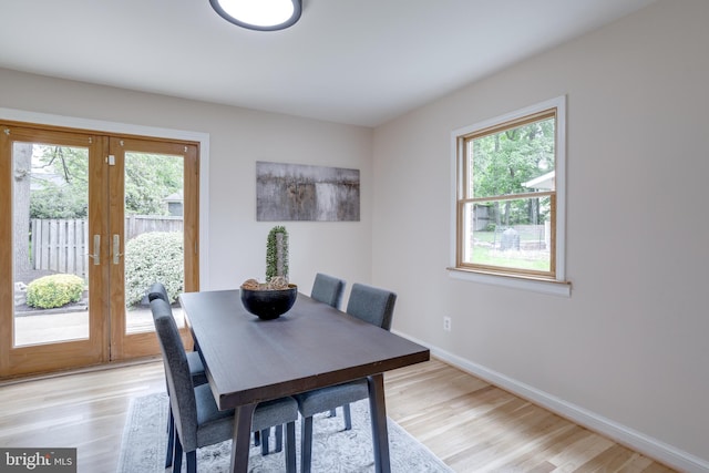 7923 Karl Rd, Alexandria, VA 22308 - dining area featuring light wood finished floors, baseboards, and french doors