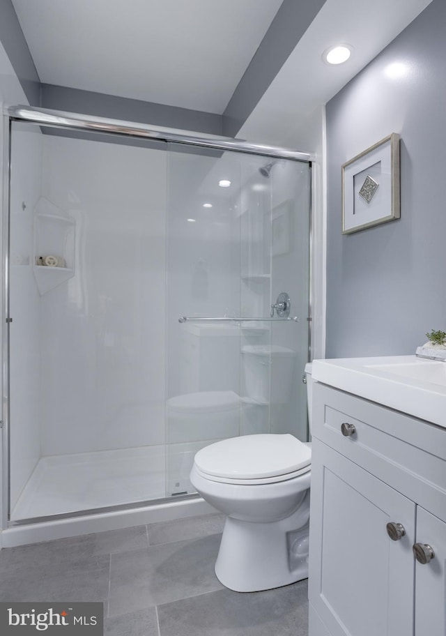 7923 Karl Rd, Alexandria, VA 22308 - full bath with toilet, a shower stall, vanity, recessed lighting, and tile patterned flooring