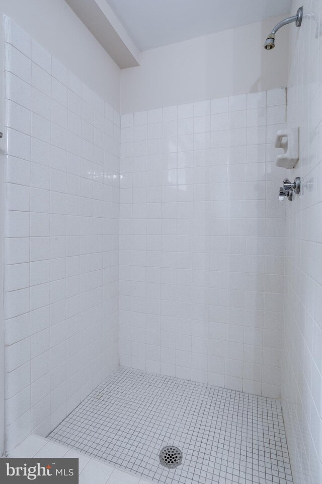 7923 Karl Rd, Alexandria, VA 22308 - full bath featuring tiled shower and tile patterned floors