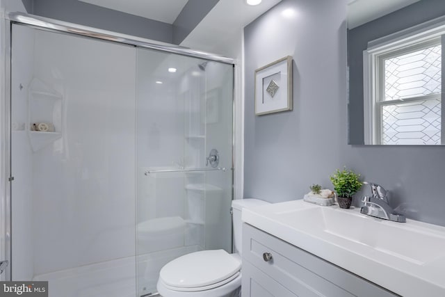 7923 Karl Rd, Alexandria, VA 22308 - bathroom featuring toilet, a stall shower, and vanity