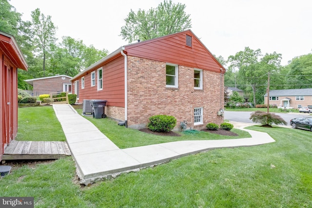7923 Karl Rd, Alexandria, VA 22308 - view of side of property with brick siding and a yard
