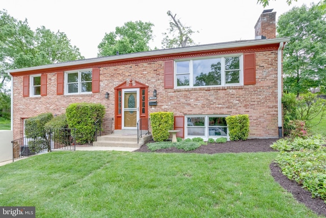7923 Karl Rd, Alexandria, VA 22308 - split foyer home with a chimney and brick siding