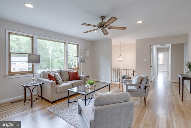 7923 Karl Rd, Alexandria, VA 22308 - living area featuring plenty of natural light, baseboards, a ceiling fan, light wood-type flooring, and recessed lighting