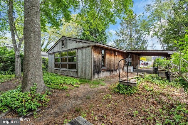 305 Nautilus Blvd, Forked River, NJ 08731 - view of outbuilding with a carport