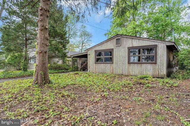 305 Nautilus Blvd, Forked River, NJ 08731 - view of outbuilding featuring a carport