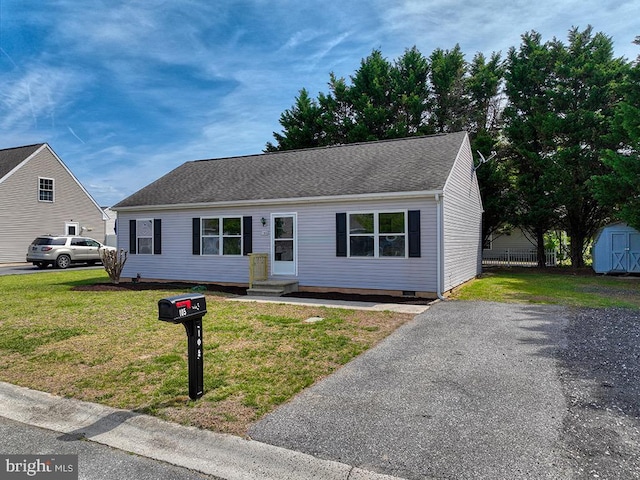 105 Sailor Ln, Milton, DE 19968 - view of front of property with a storage unit, entry steps, and an outbuilding