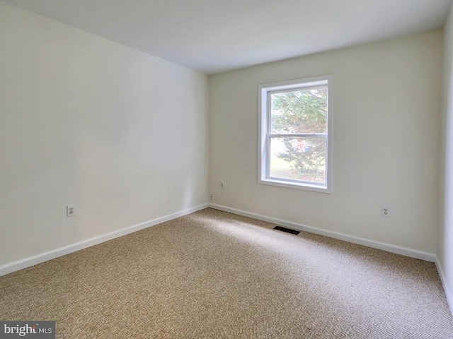 105 Sailor Ln, Milton, DE 19968 - empty room featuring light carpet and baseboards