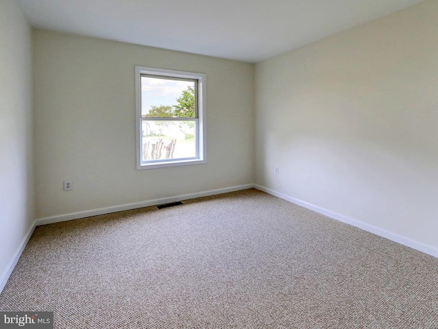 105 Sailor Ln, Milton, DE 19968 - carpeted spare room with baseboards