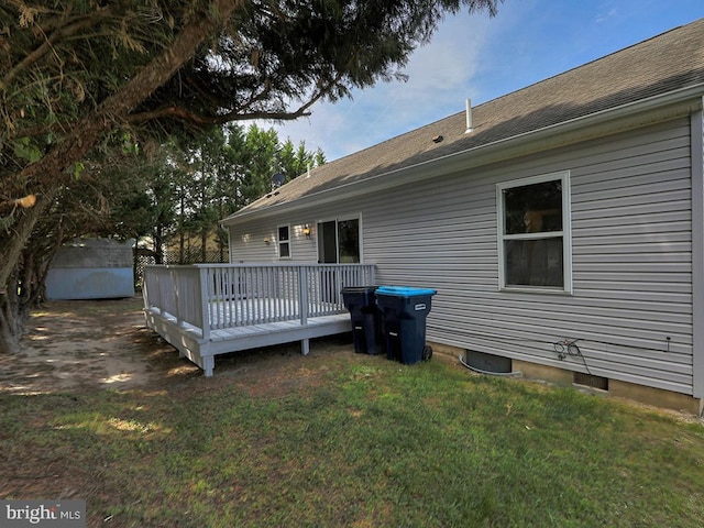 105 Sailor Ln, Milton, DE 19968 - back of house featuring a wooden deck and a yard