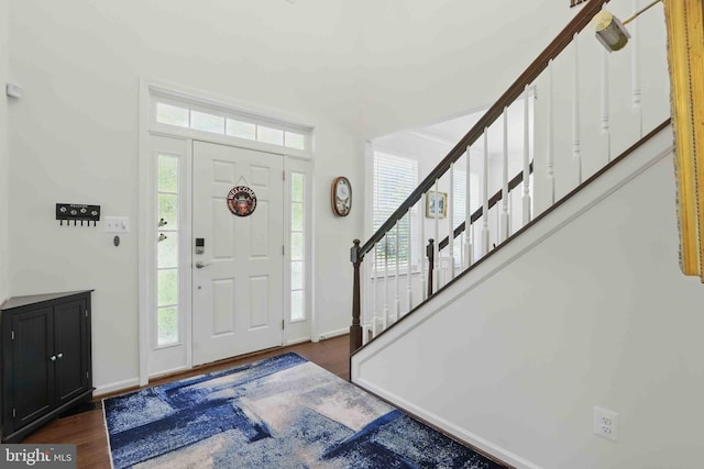 7571 Kindler Overlook Dr, Laurel, MD 20723 - foyer with stairway, plenty of natural light, baseboards, and wood finished floors