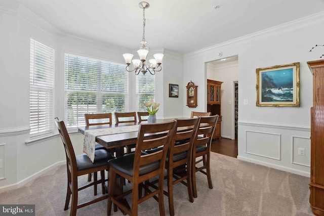 7571 Kindler Overlook Dr, Laurel, MD 20723 - dining space featuring a chandelier, light carpet, and ornamental molding