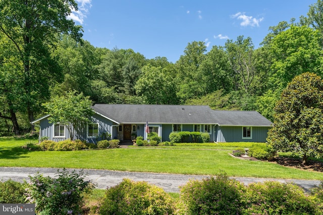 13928 Green Branch Dr, Phoenix, MD 21131 - ranch-style home featuring a front lawn and a forest view