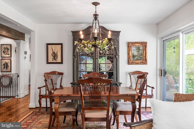 13928 Green Branch Dr, Phoenix, MD 21131 - dining room with a chandelier, wood finished floors, and baseboards