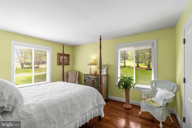13928 Green Branch Dr, Phoenix, MD 21131 - bedroom featuring multiple windows, baseboards, and wood finished floors