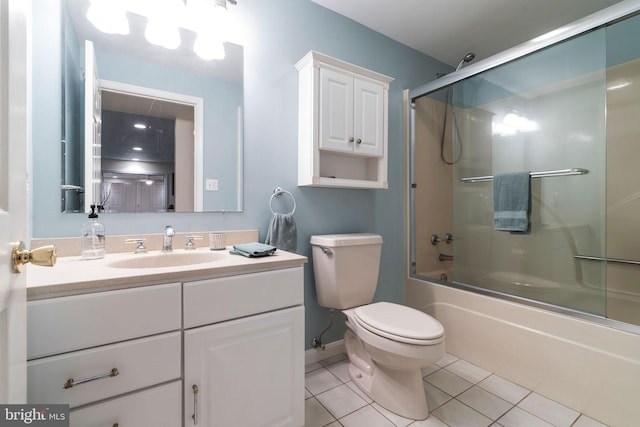 13928 Green Branch Dr, Phoenix, MD 21131 - bathroom featuring tile patterned flooring, vanity, toilet, combined bath / shower with glass door, and baseboards