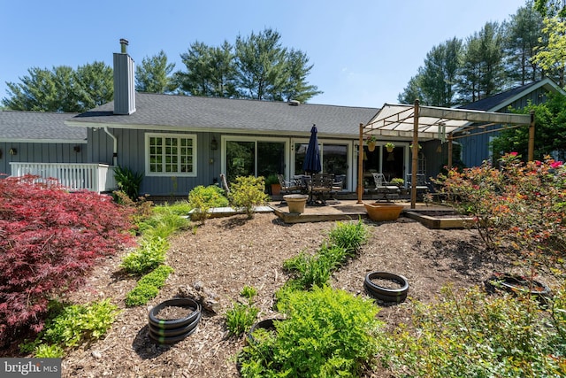 13928 Green Branch Dr, Phoenix, MD 21131 - back of property featuring board and batten siding, roof with shingles, a patio area, and a pergola