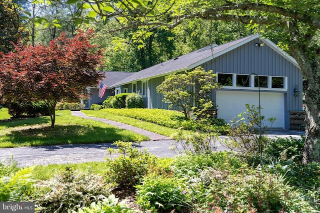 13928 Green Branch Dr, Phoenix, MD 21131 - view of front facade with a shingled roof and board and batten siding