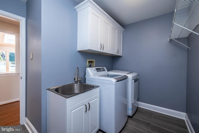 106 Girard Ave, Hatboro, PA 19040 - laundry room featuring cabinet space, independent washer and dryer, dark wood finished floors, and baseboards