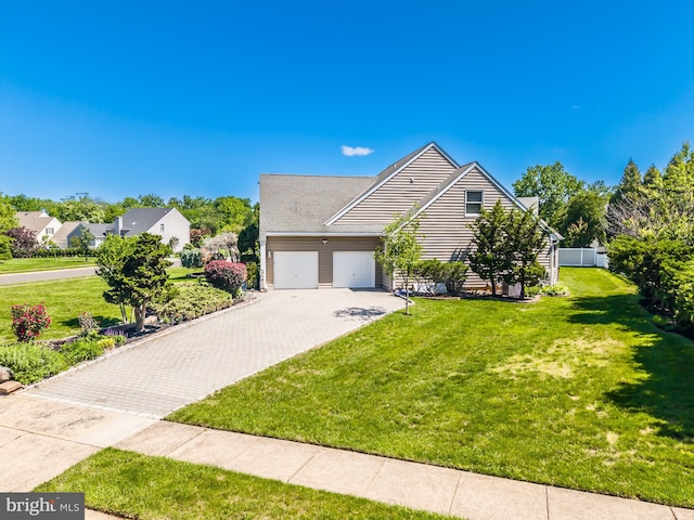 106 Girard Ave, Hatboro, PA 19040 - view of front of home with a garage and decorative driveway