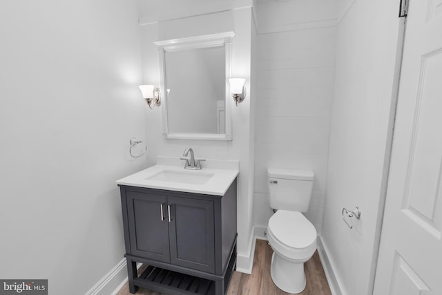 700 Strahle St, Philadelphia, PA 19111 - bathroom featuring wood finished floors, toilet, baseboards, and vanity