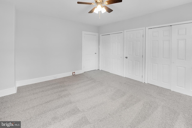 700 Strahle St, Philadelphia, PA 19111 - unfurnished bedroom with multiple closets, carpet flooring, baseboards, and a ceiling fan