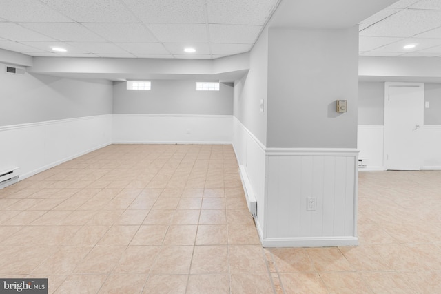 700 Strahle St, Philadelphia, PA 19111 - basement featuring a drop ceiling, wainscoting, light tile patterned floors, and recessed lighting