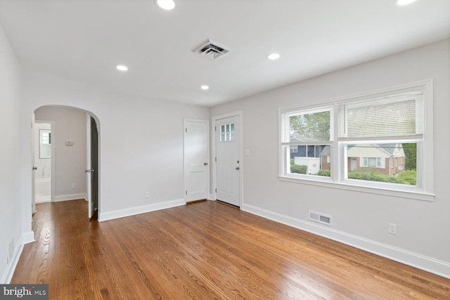 9606 Oak Summit Ave, Baltimore, MD 21234 - foyer entrance featuring arched walkways, plenty of natural light, recessed lighting, wood finished floors, and baseboards