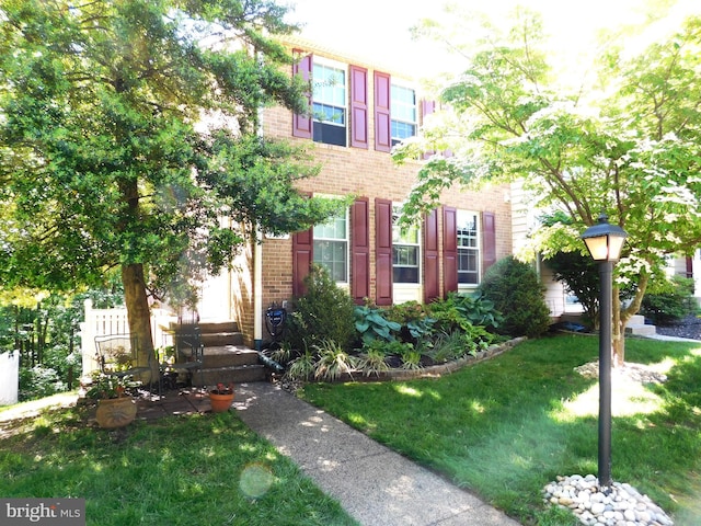 1559 Autumn Ridge Cir, Reston, VA 20194 - colonial inspired home with brick siding and a front yard