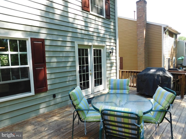 1559 Autumn Ridge Cir, Reston, VA 20194 - deck featuring area for grilling, outdoor dining area, and french doors