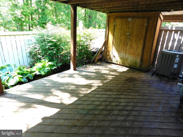 1559 Autumn Ridge Cir, Reston, VA 20194 - wooden deck with central AC unit and fence