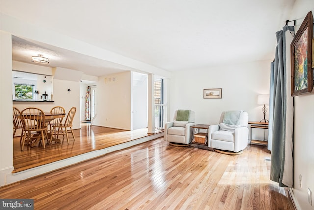 1559 Autumn Ridge Cir, Reston, VA 20194 - living area with plenty of natural light and wood finished floors